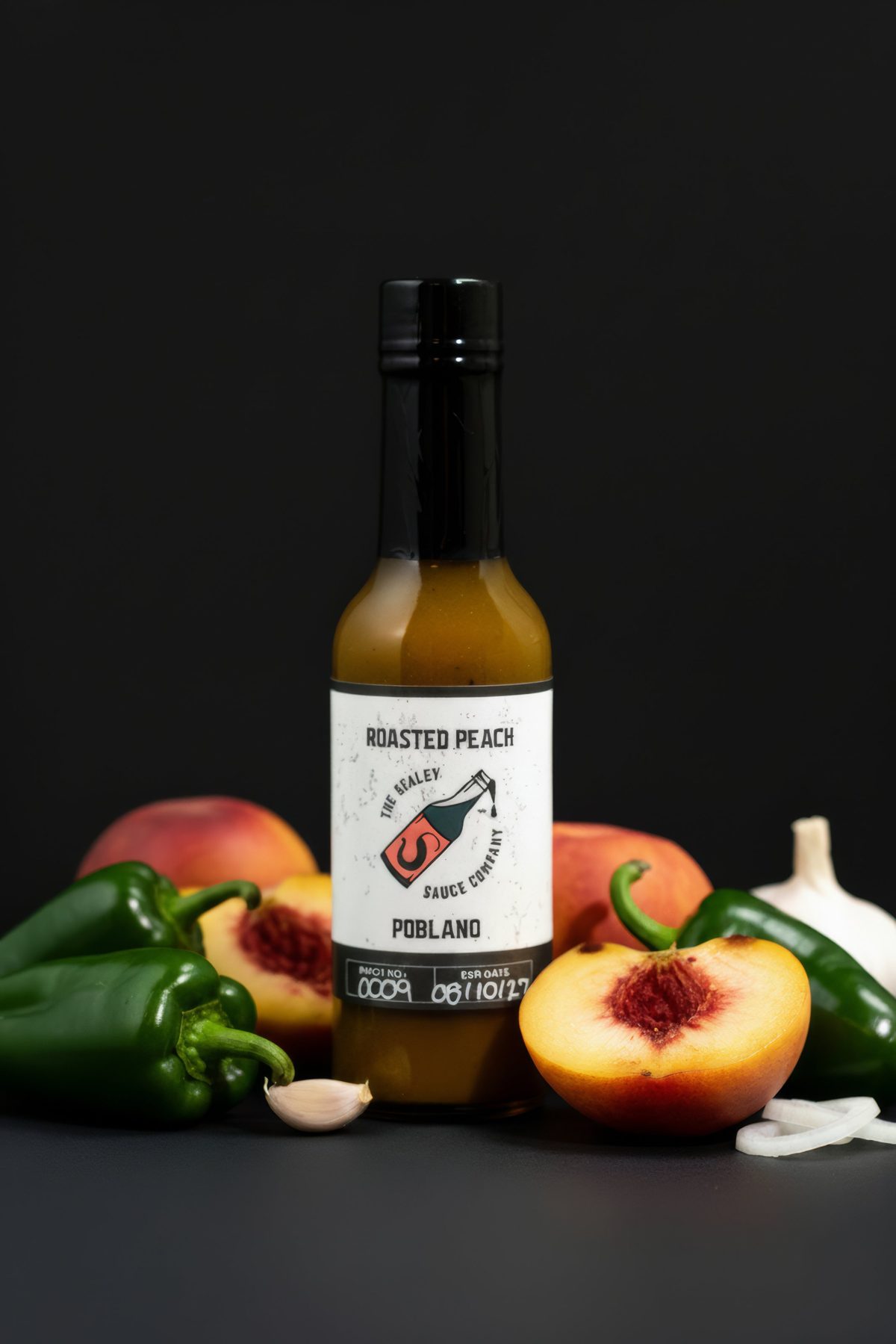 Roasted Peach Poblano with halved peaches, poblano peppers, and garlic — photo by Jimmy Warr