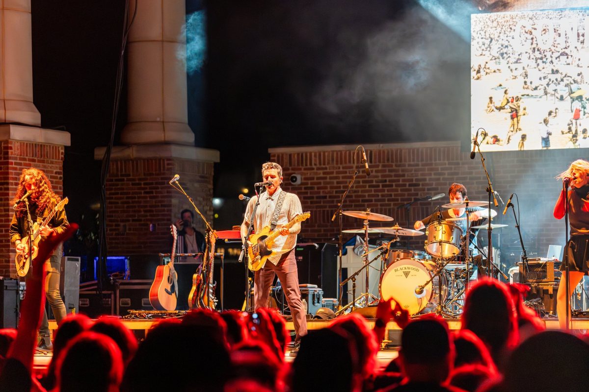 Dashboard Confessional plays to a red-lit crowd under the brick columns of Hunter Amphitheater — photo by Jimmy Warr
